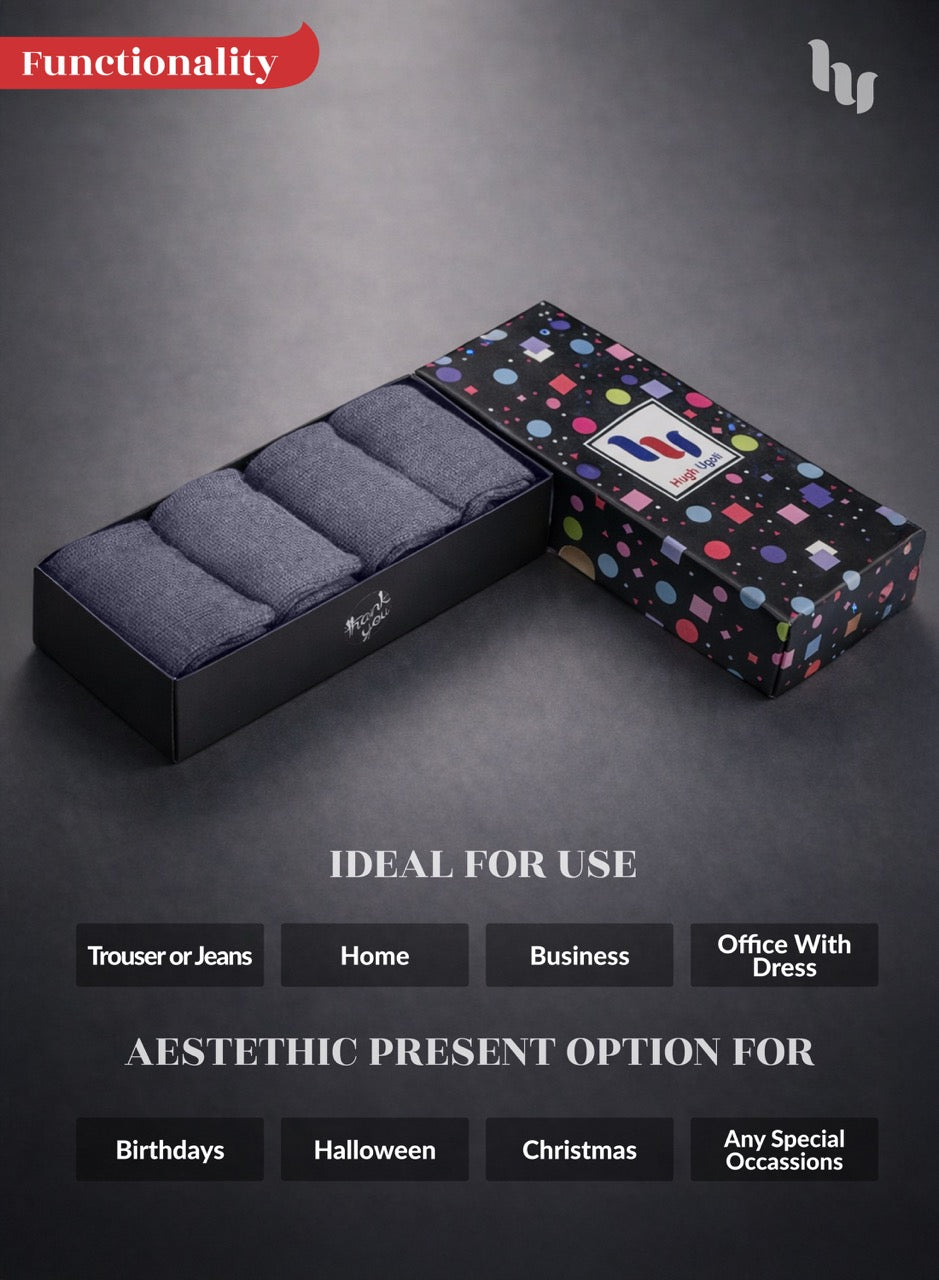 Black box with gray socks on a dark background, featuring a colorful patterned lid.