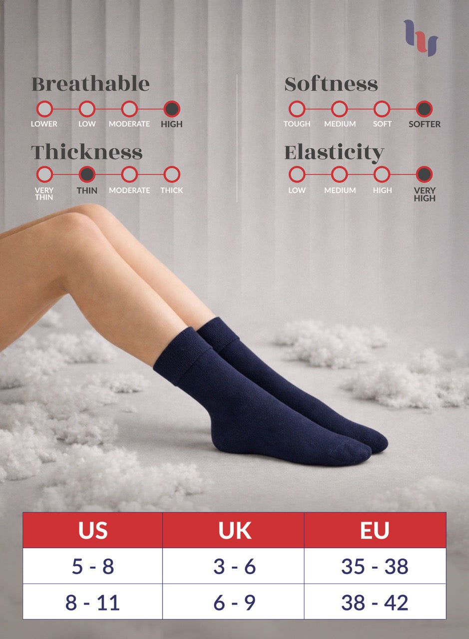 Navy blue socks with comfort features and size chart on a textured background