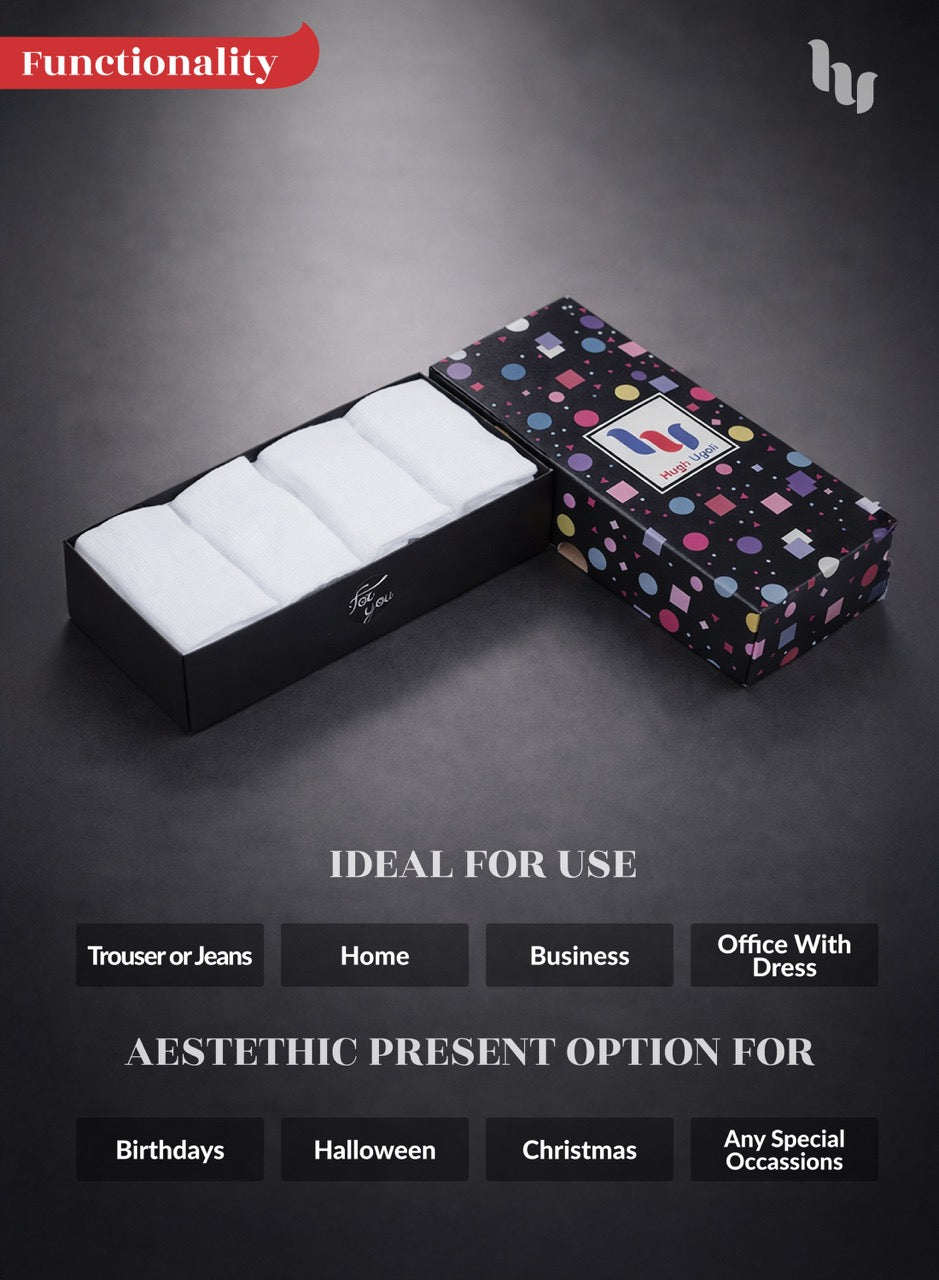 Black box with white items and colorful polka dot cover on a dark background