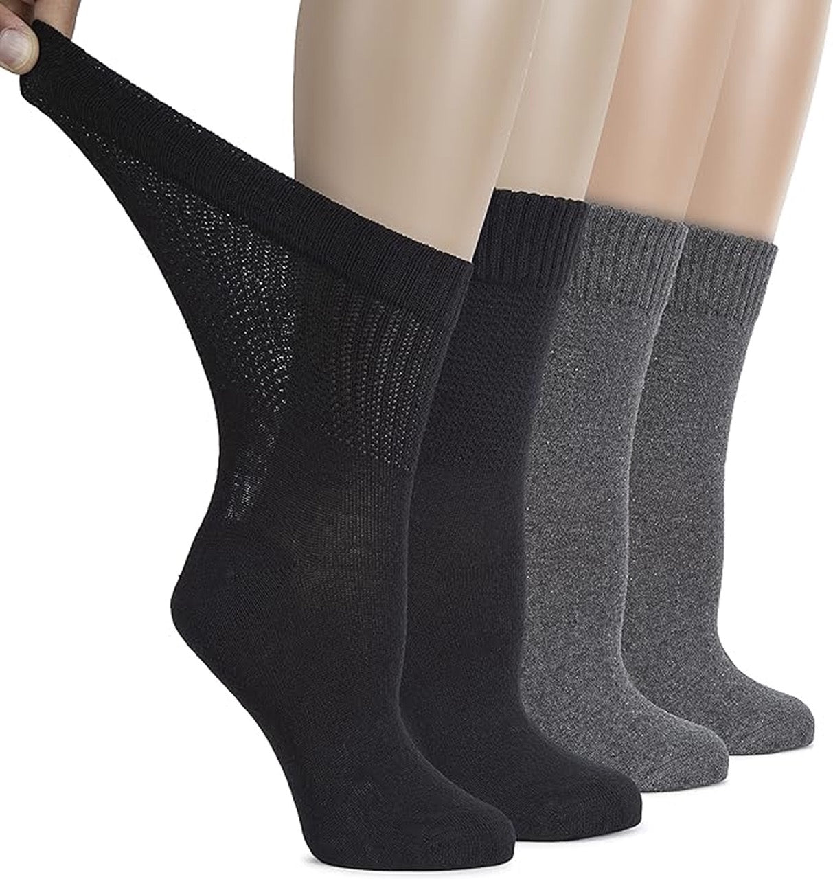 Black and gray socks displayed on a mannequin with a white background