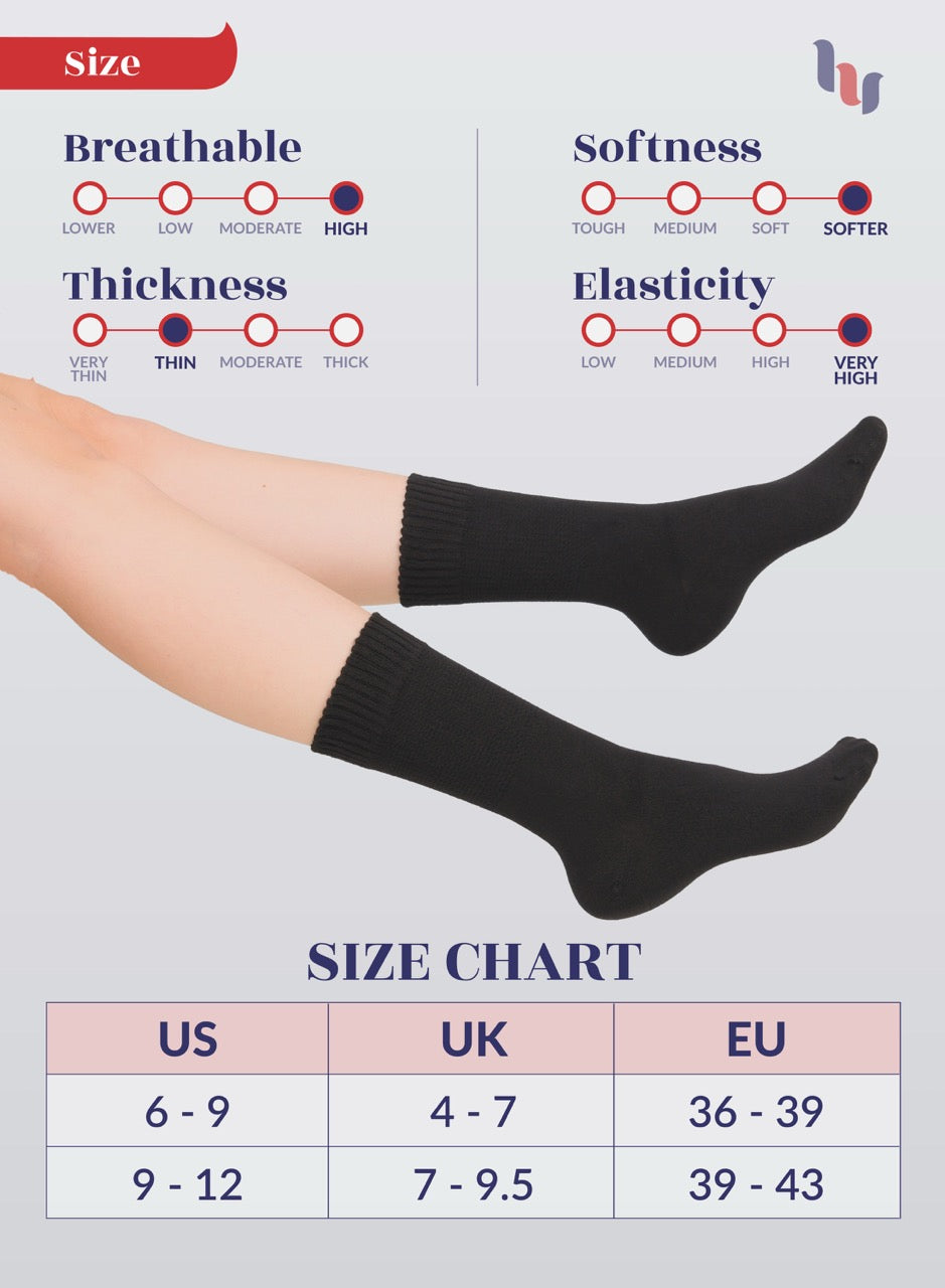 Black socks being worn with size chart and feature ratings on a gray background