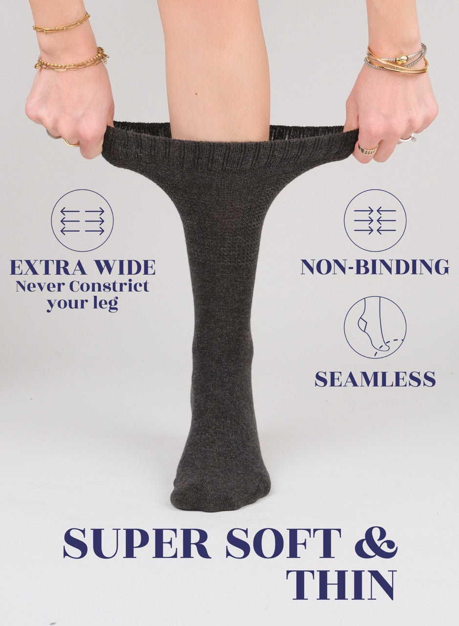 Person wearing a charcoal sock with text highlighting features on a white background