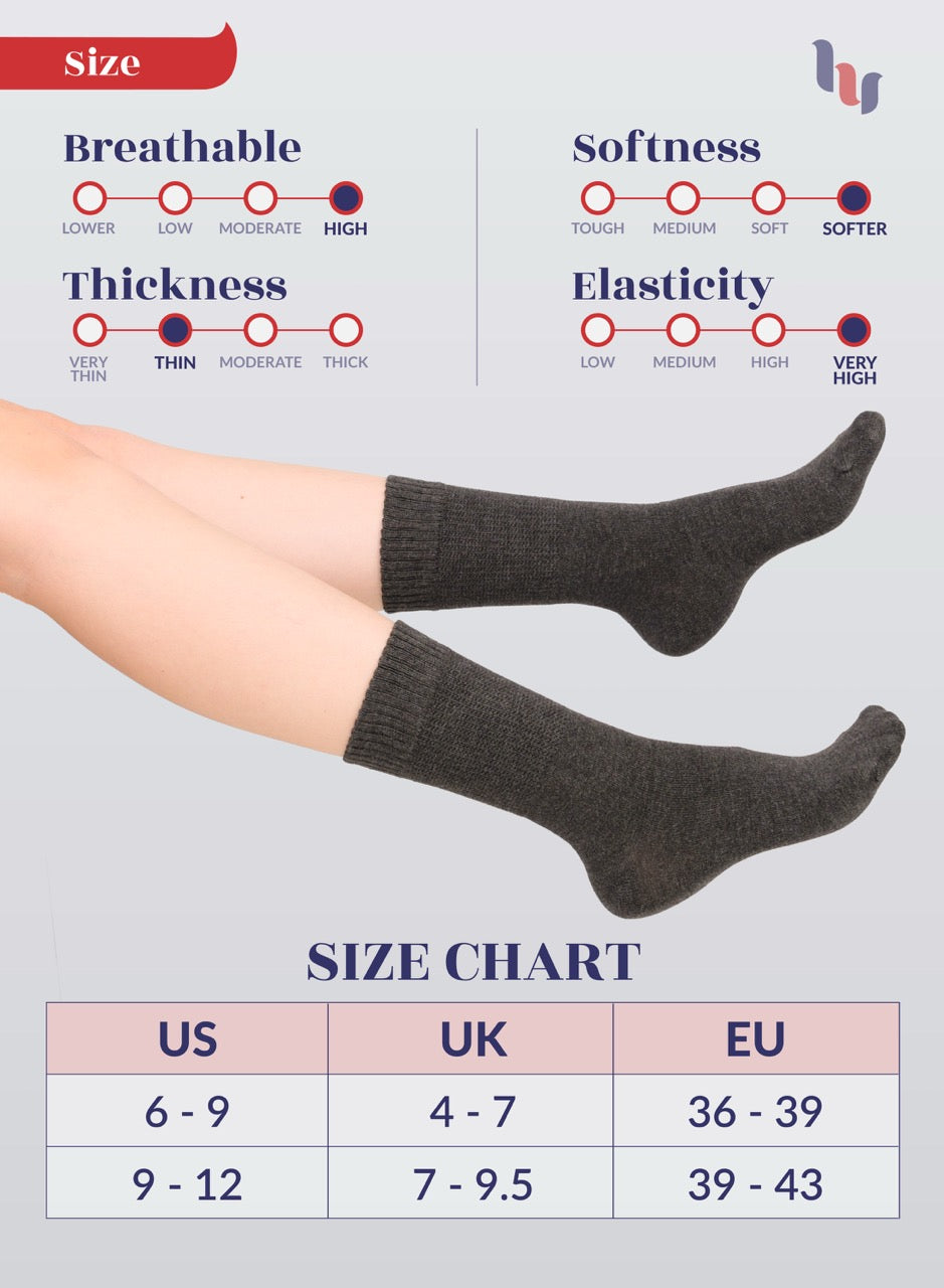 charcoal socks being worn with size chart and feature ratings on a light gray background