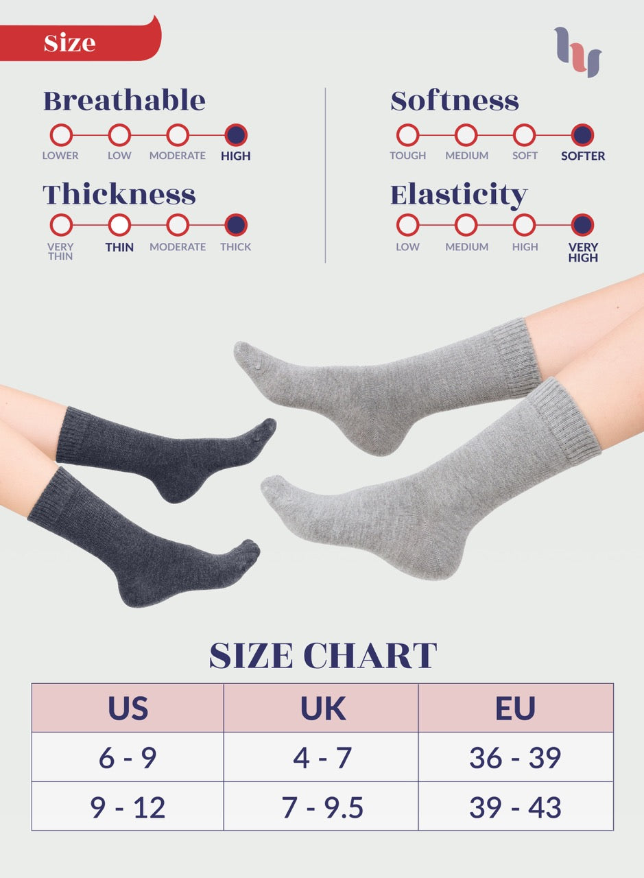 Gray socks being worn with size chart and feature ratings on a white background