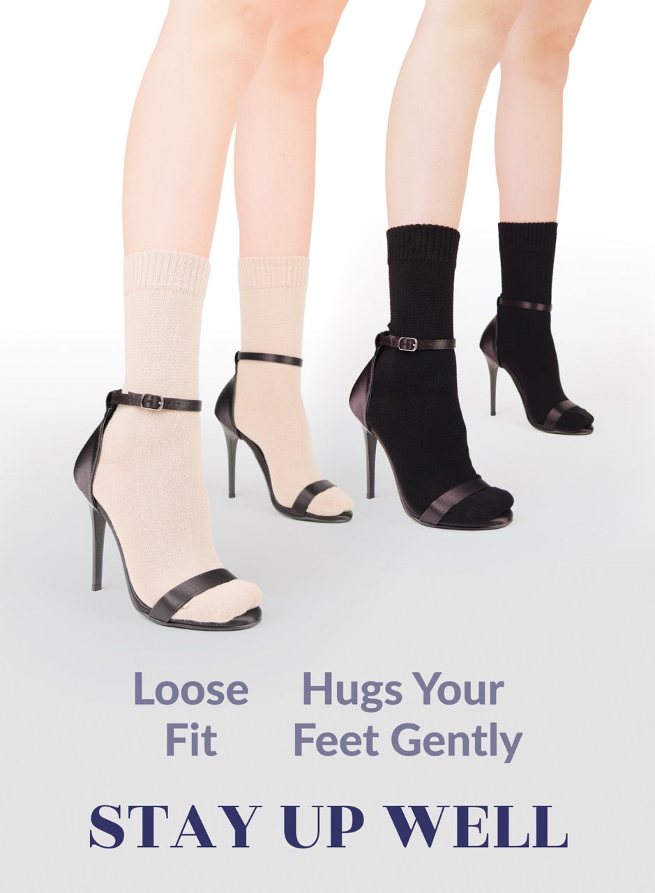 Two pairs of high-heeled shoes with text about sock fit on a light gray background