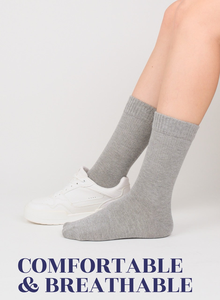 Light Gray socks worn with white sneakers on a light gray background, with text 'COMFORTABLE & BREATHABLE'.