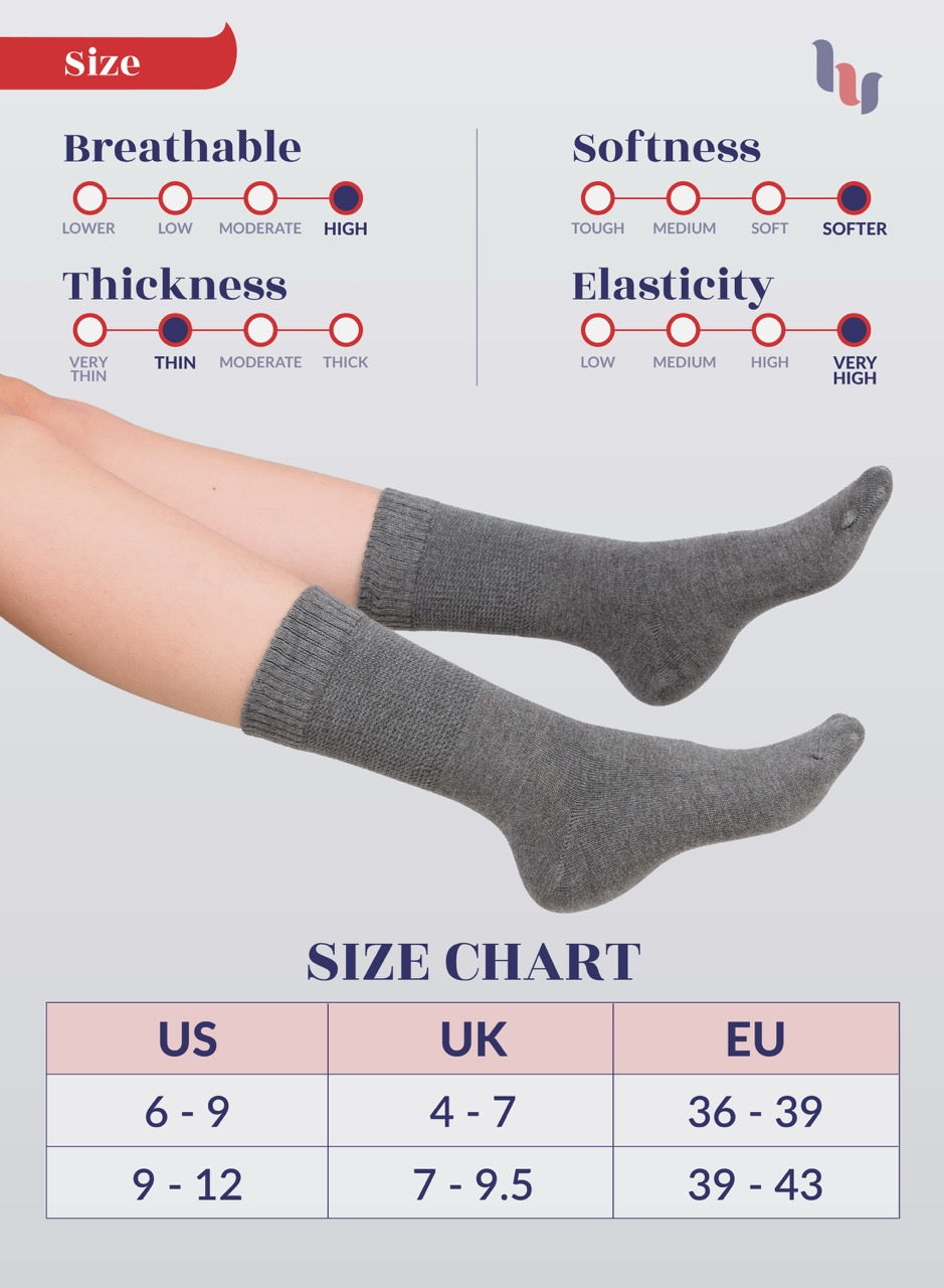 Melange Gray socks being worn with a size chart and feature ratings on a light gray background