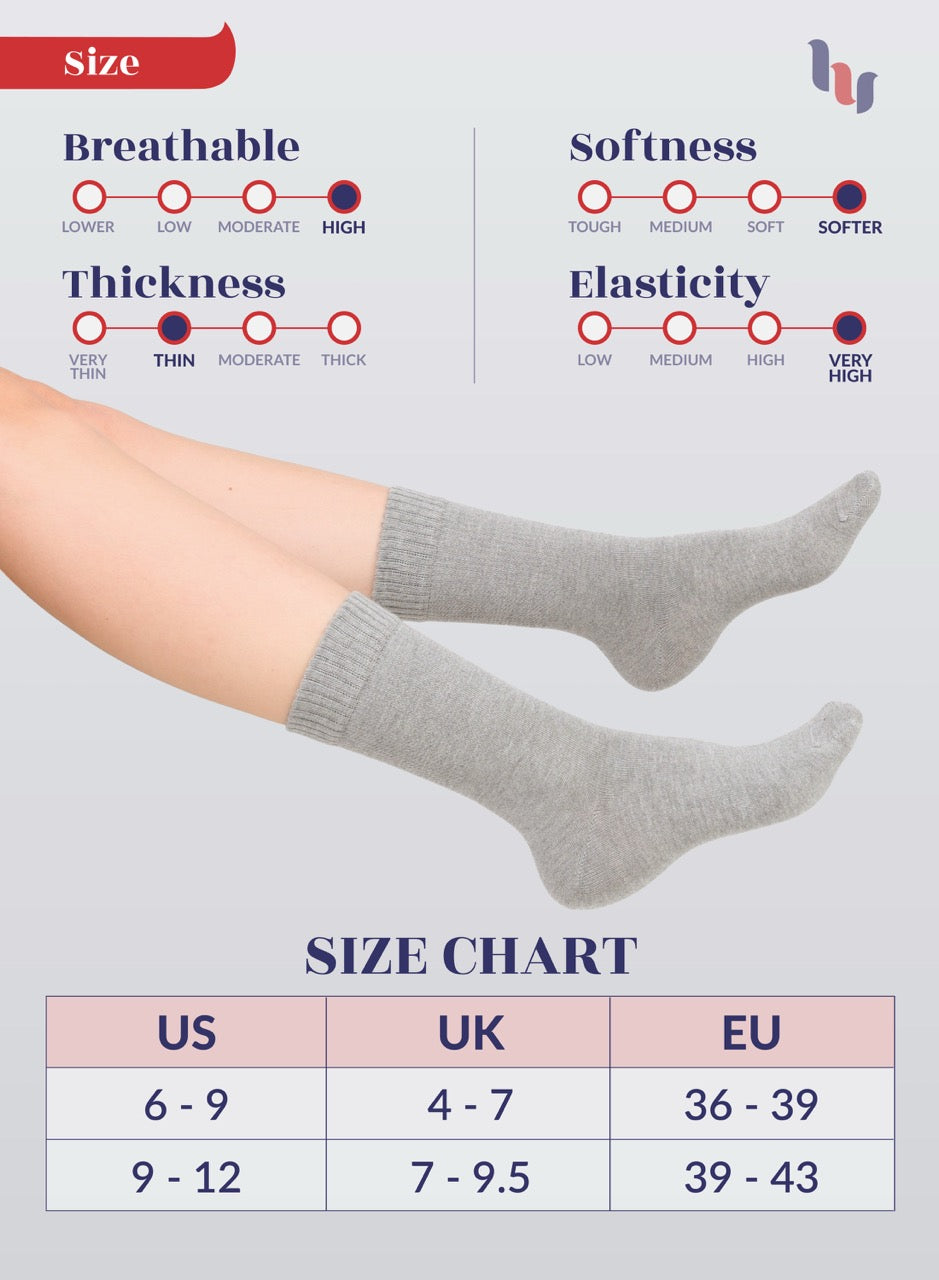 light Gray socks being worn with size chart and feature ratings on a light gray background