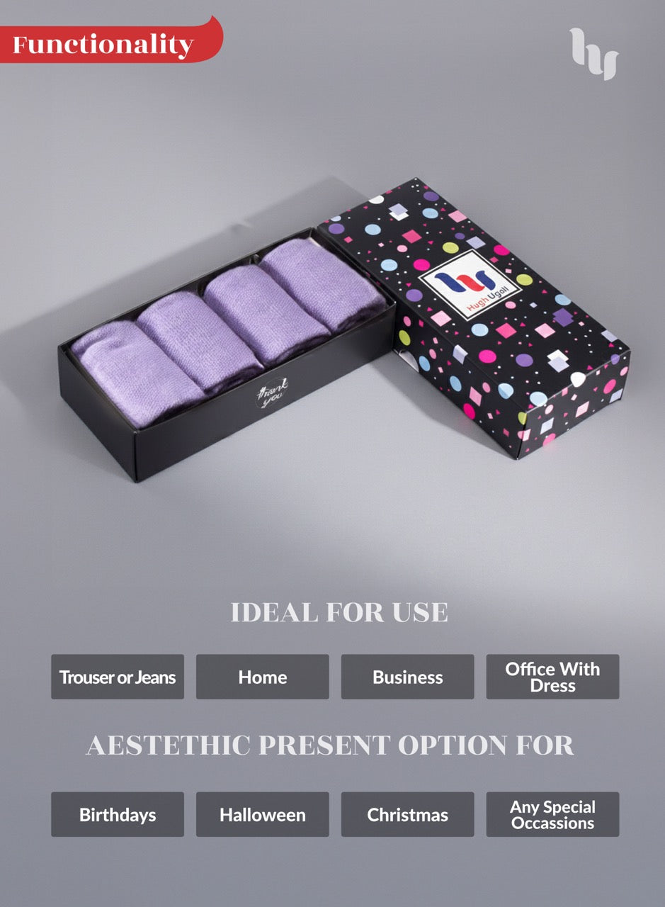 Set of Aster purple socks in a decorative box on a gray background