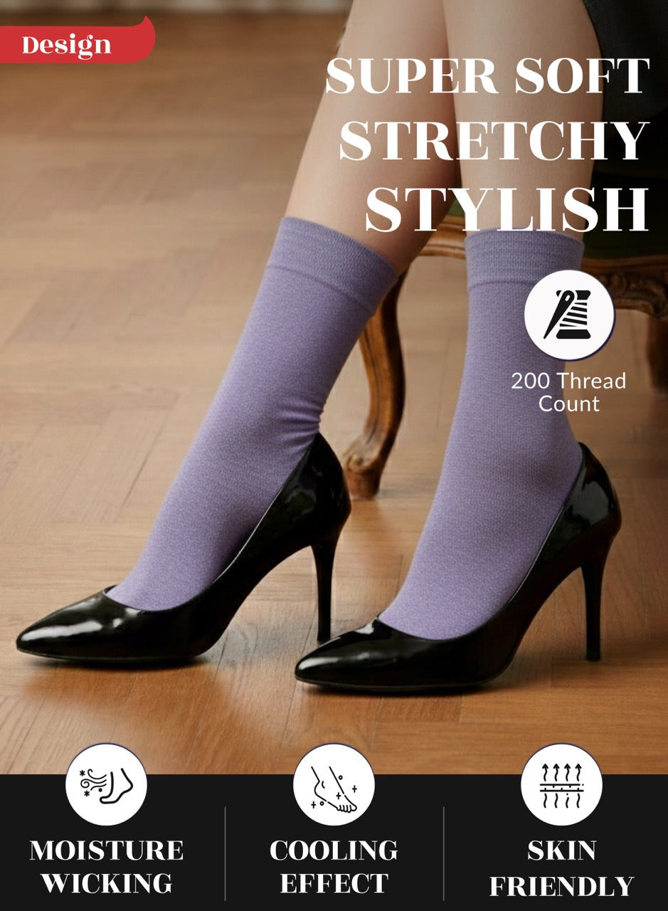 Aster purple socks worn with black high heels on a wooden floor, with text highlighting features like 'Super Soft', 'Stretchy', 'Stylish', 'Moisture Wicking', 'Cooling Effect', and 'Skin Friendly'.