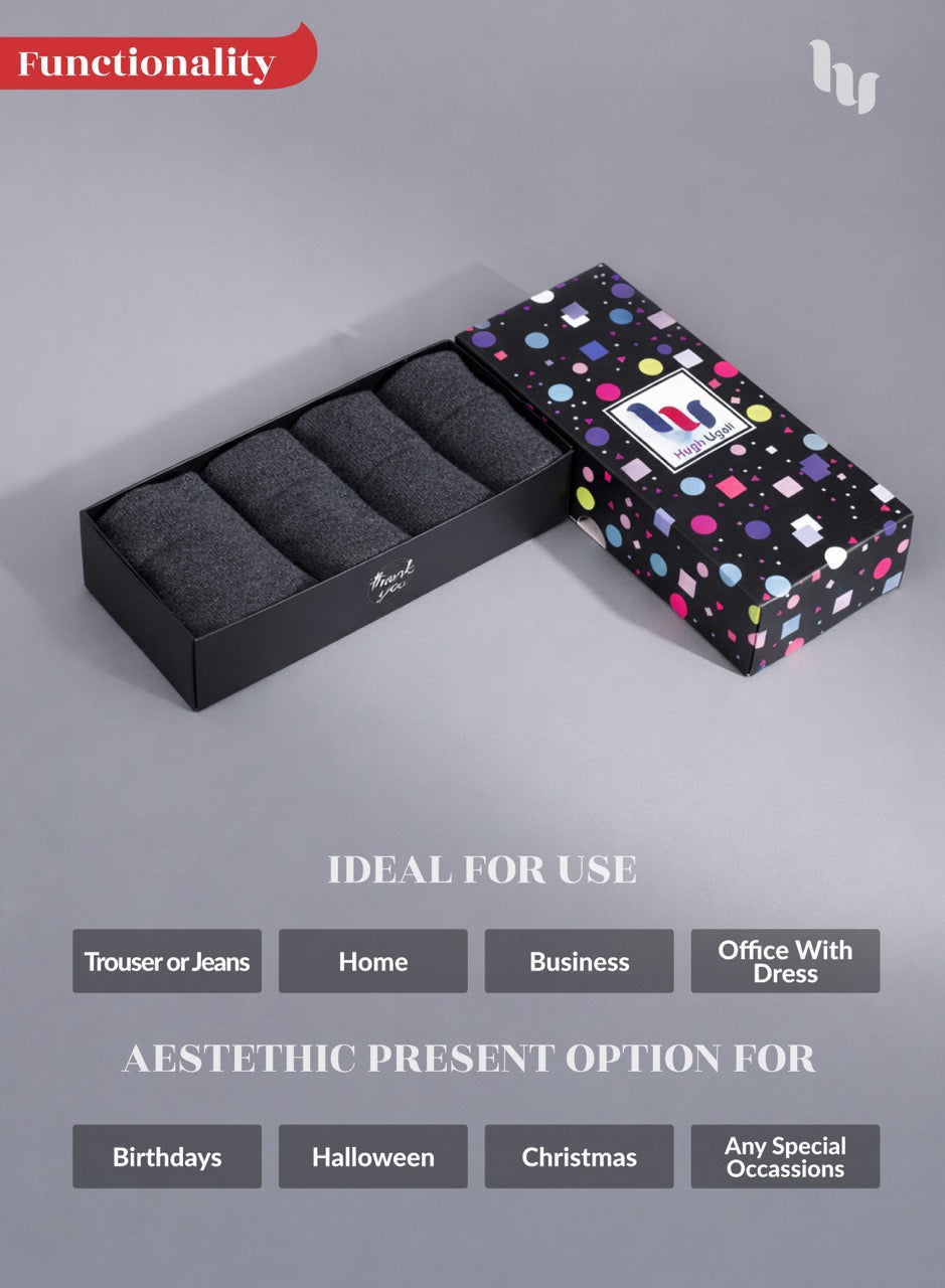 Black box with Charcoal grey socks and colorful polka dot exterior on a gray background