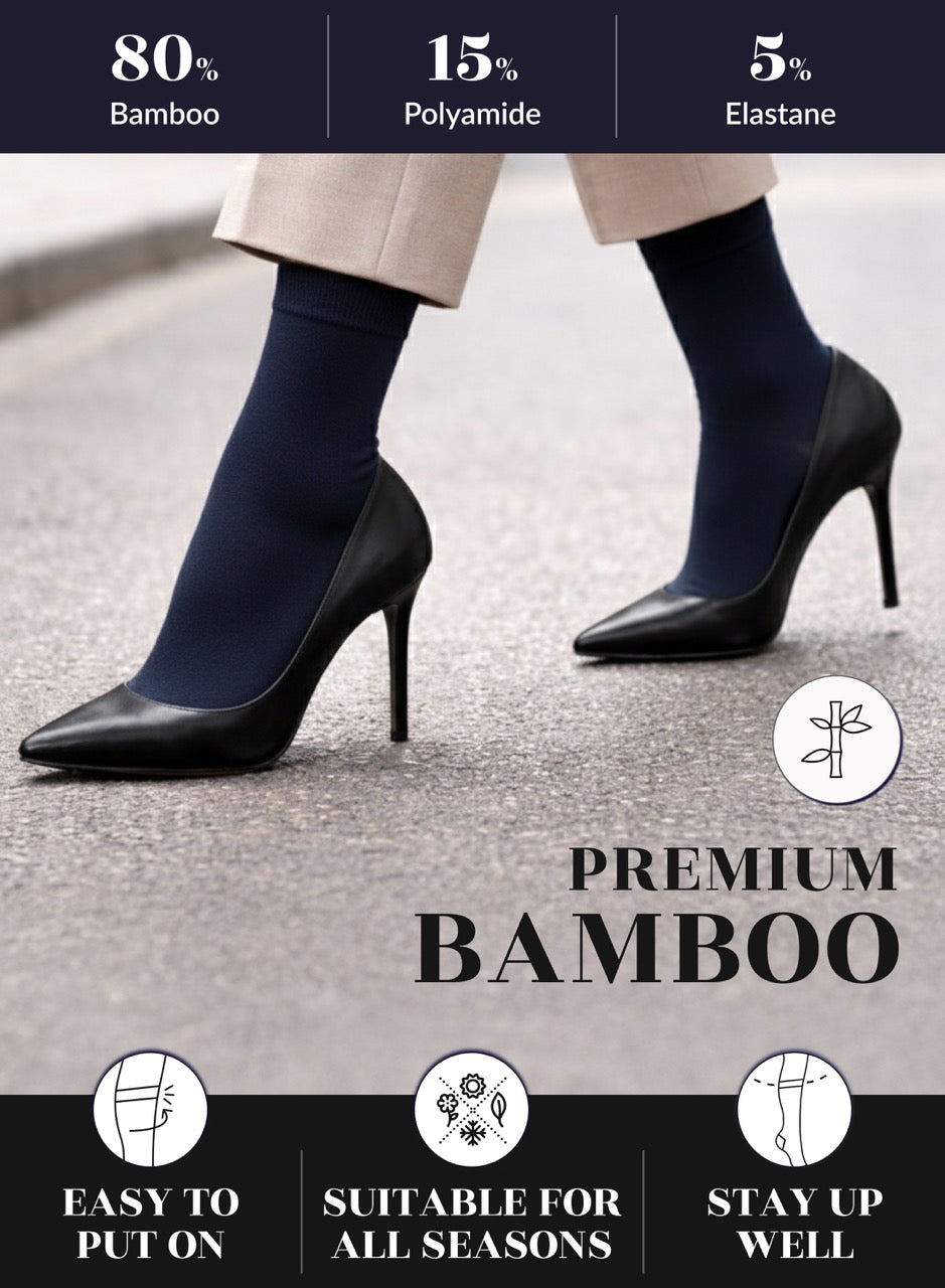 Navy blue socks with high heels on a gray background, featuring bamboo content and product benefits.