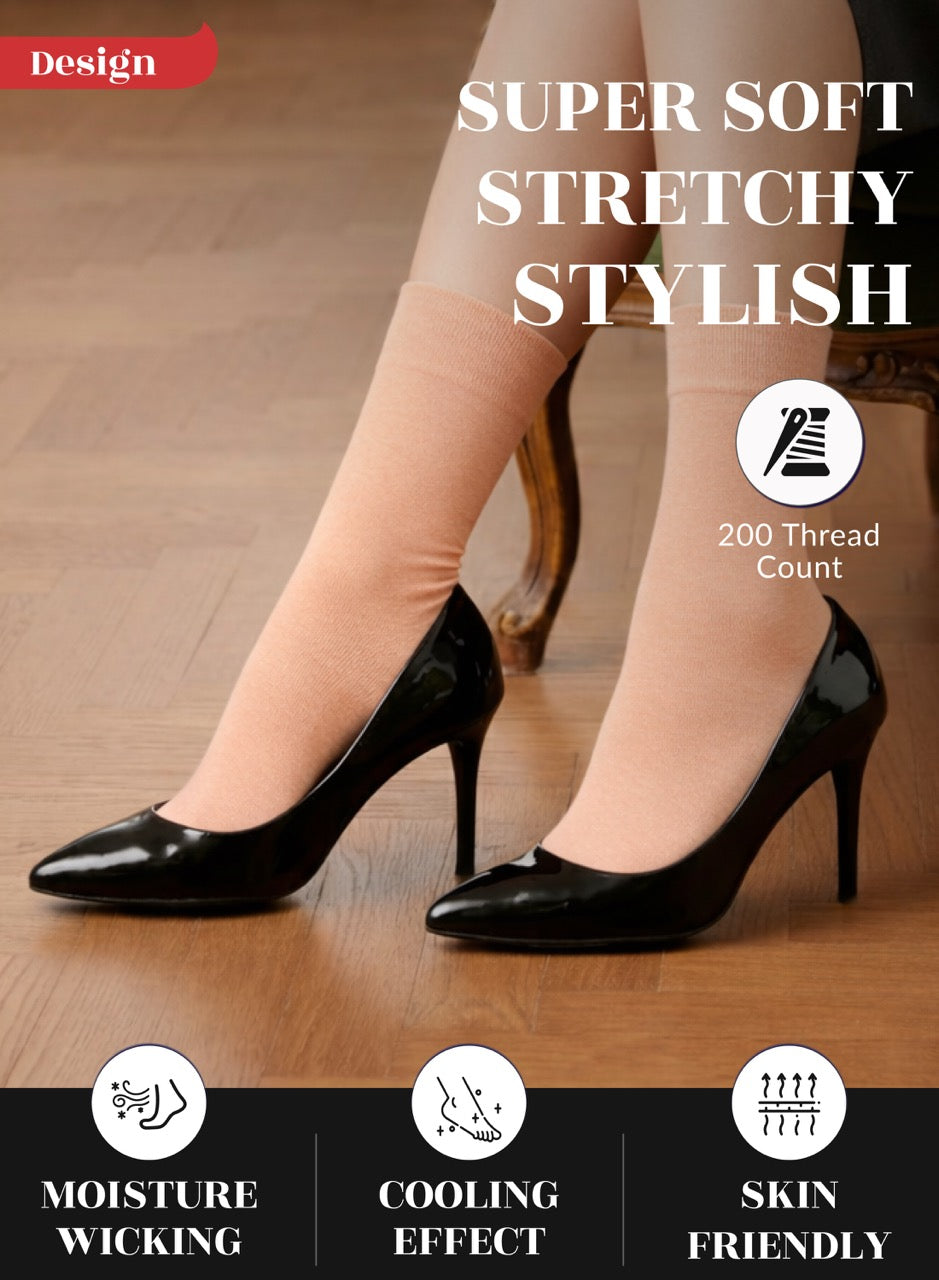 Peach Rose socks with black high heels on a wooden floor, highlighting features like softness, stretchiness, and style.