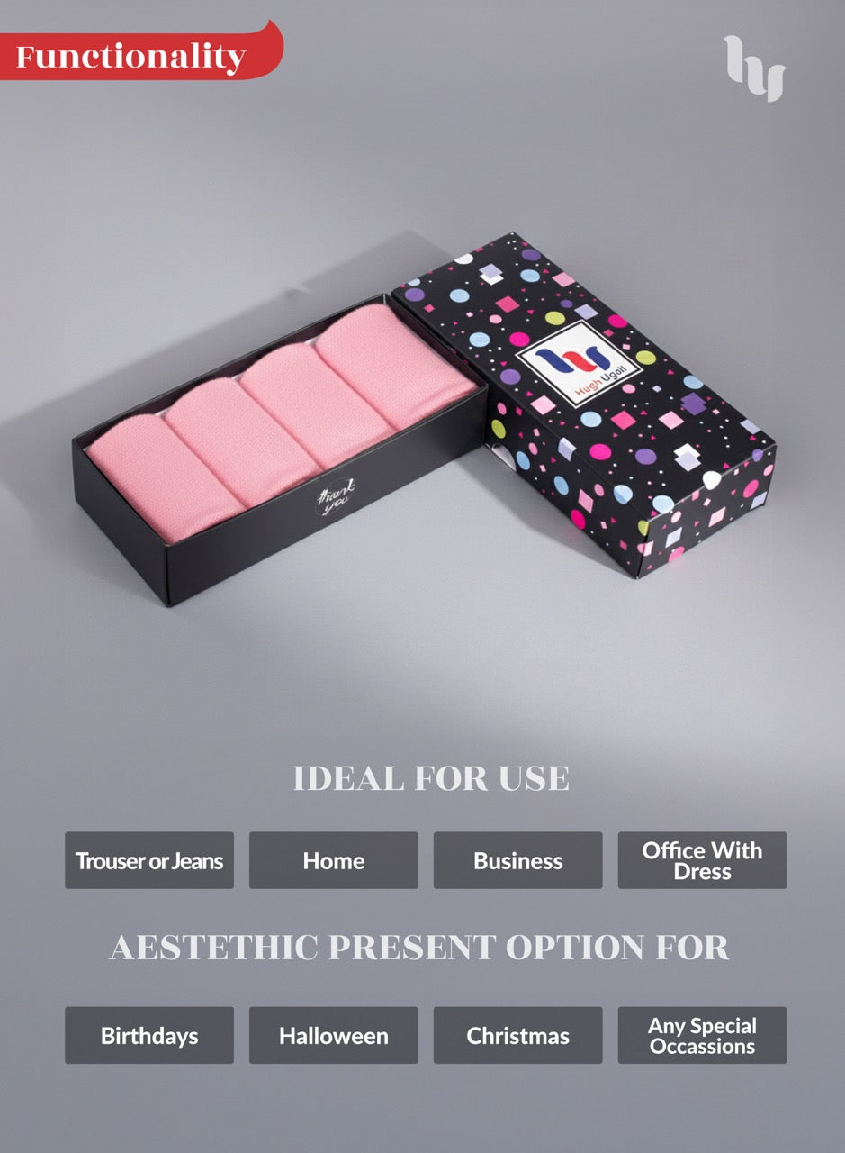 Pink socks in a patterned box on a gray background