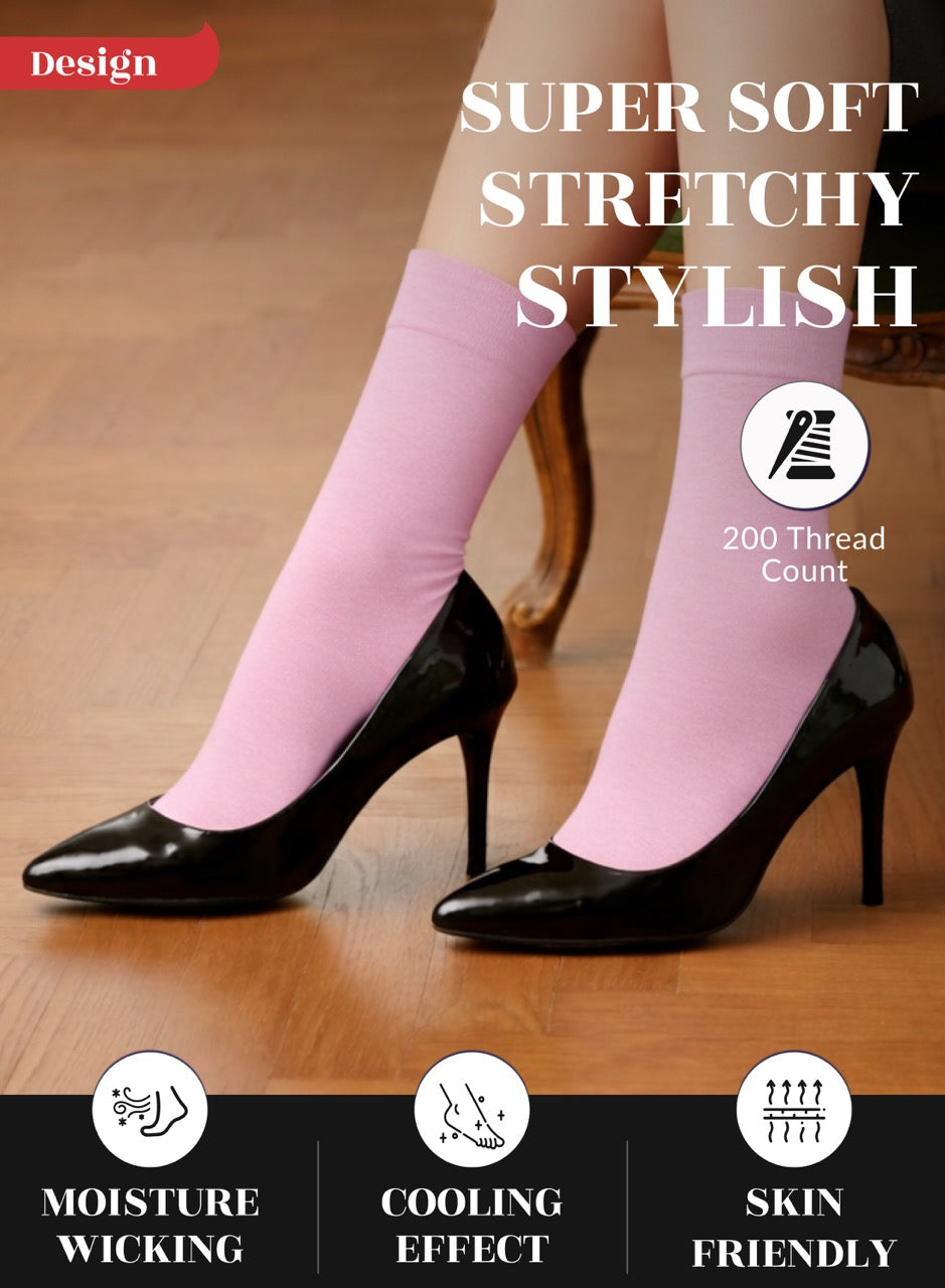 Pink socks with black high heels on a wooden floor, featuring text about product features.