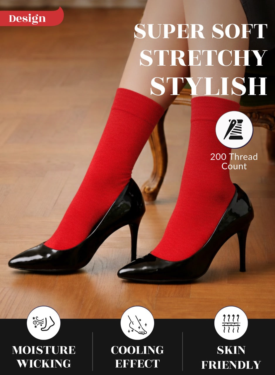 Red socks being worn with black high heels on a wooden floor, featuring text about sock properties.