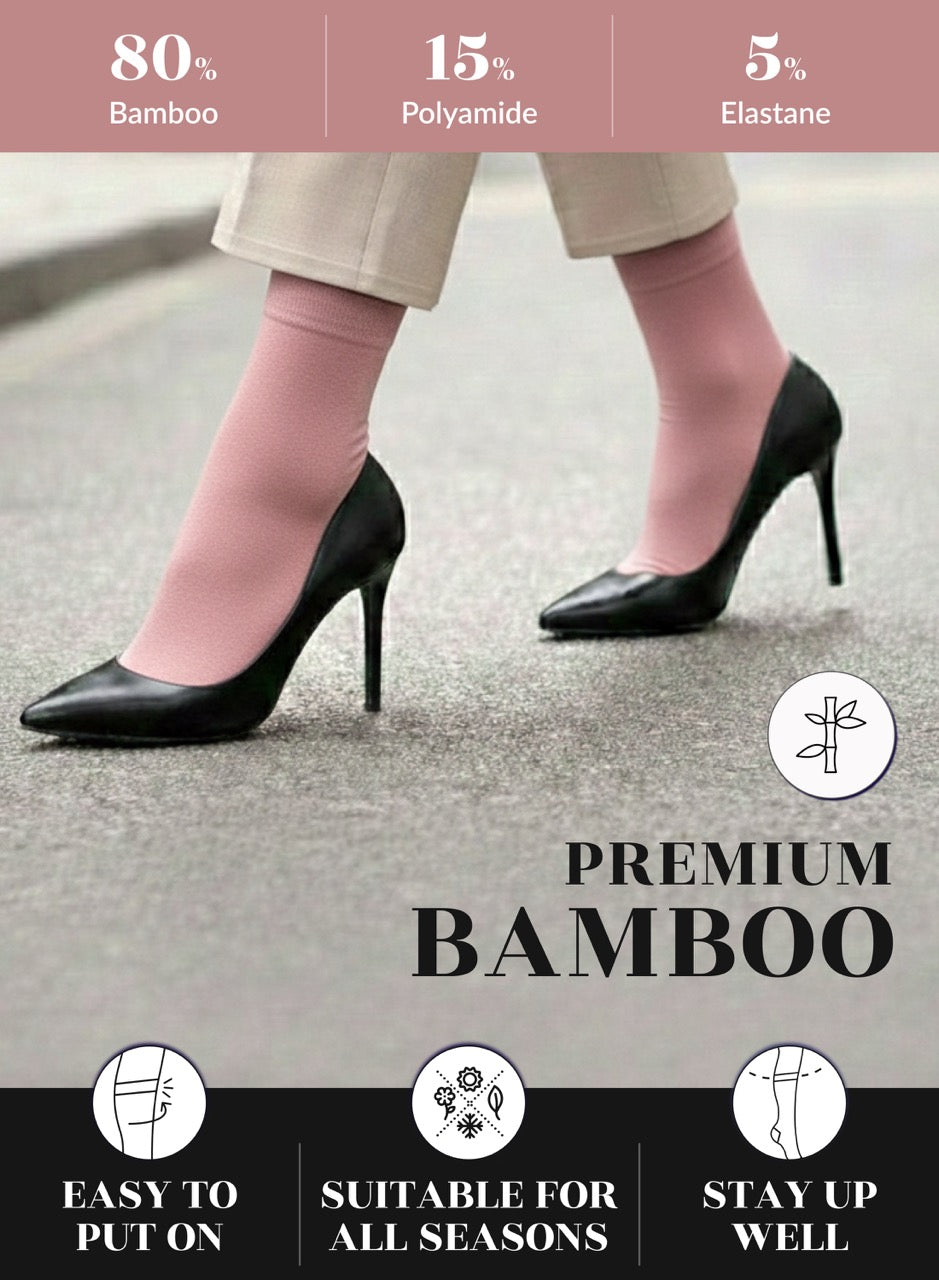 Person wearing rose cloud socks with black high heels on a road, with text about bamboo content and product features.