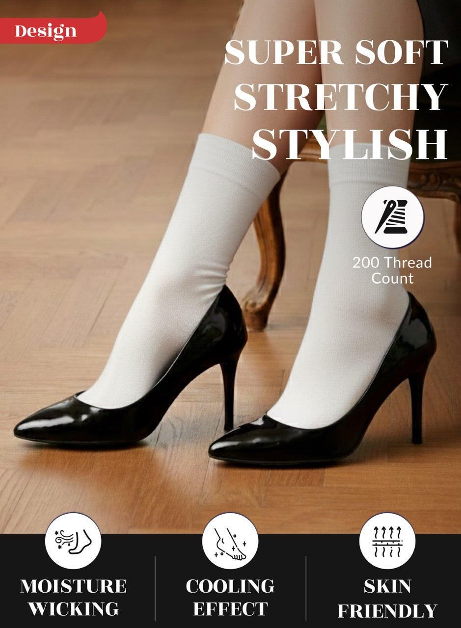 White crew socks with black high heels on a wooden floor, featuring text about sock properties.