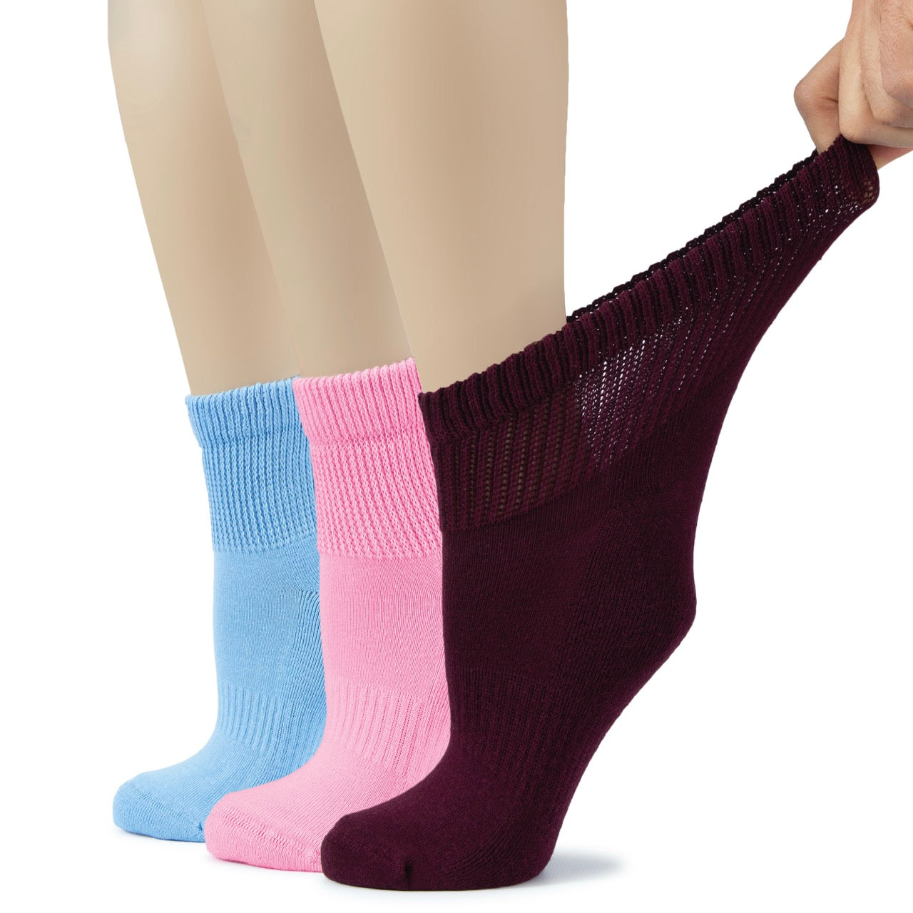 Three pairs of socks in blue, pink, and burgundy on a white background