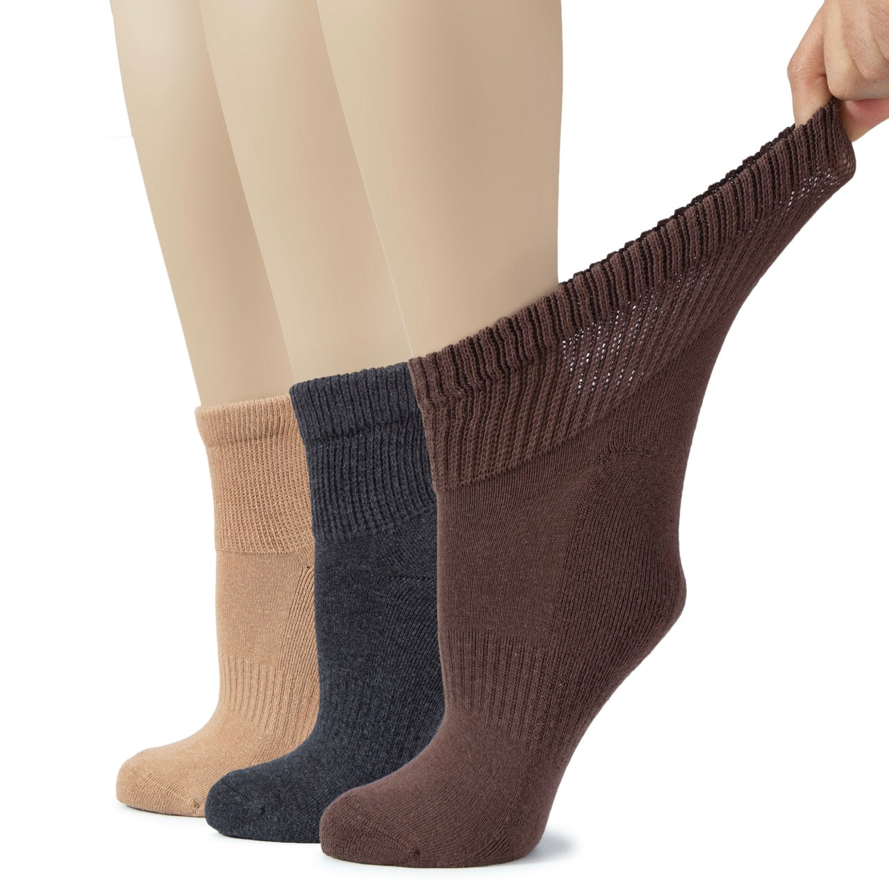 Three pairs of socks in brown, dark grey, and beige held by a hand on a white background.