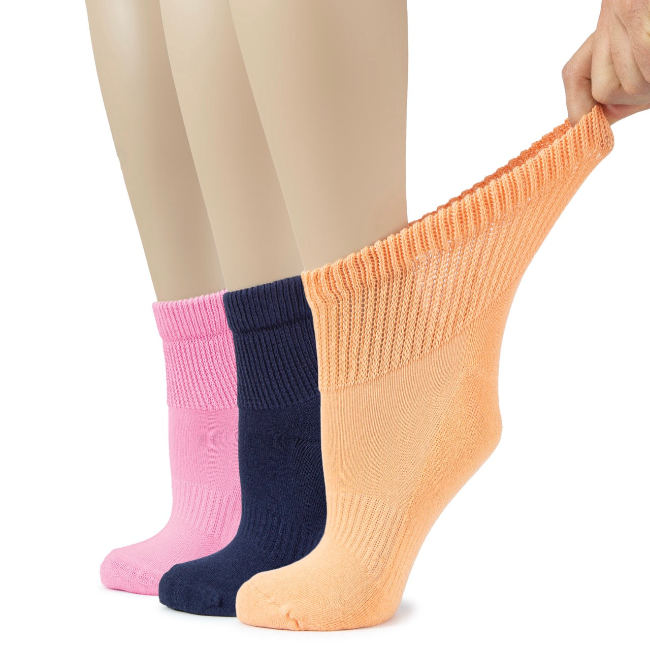 Three pairs of colorful socks in pink, navy blue, and beige on a white background.