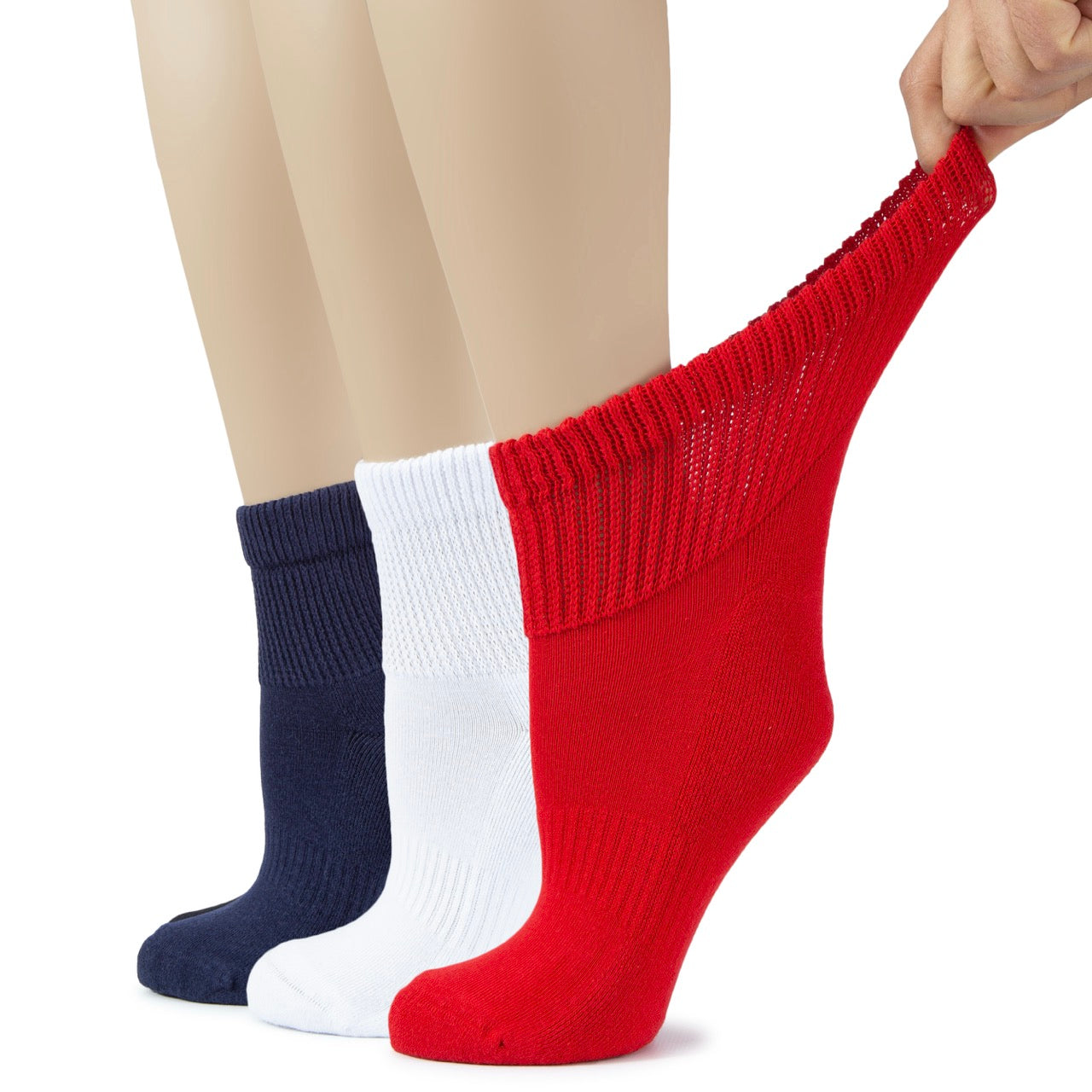 Three pairs of socks in red, white, and navy blue on a white background
