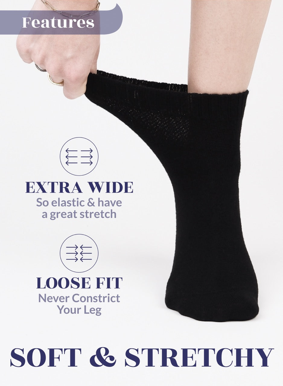 Black sock being worn with text highlighting features on a white background