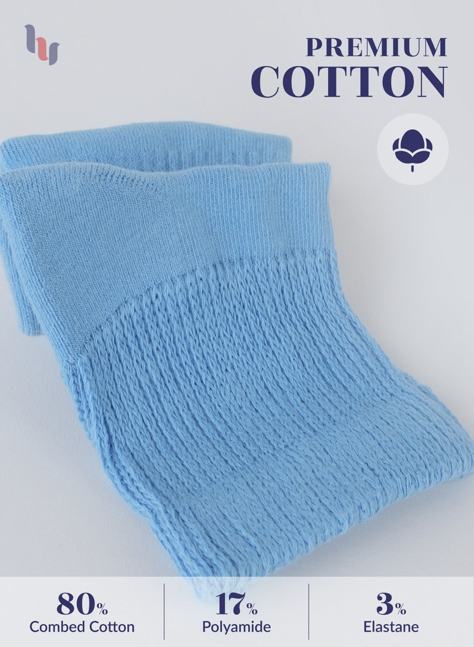 Blue sock with 'Premium Cotton' label and material composition details on a light gray background