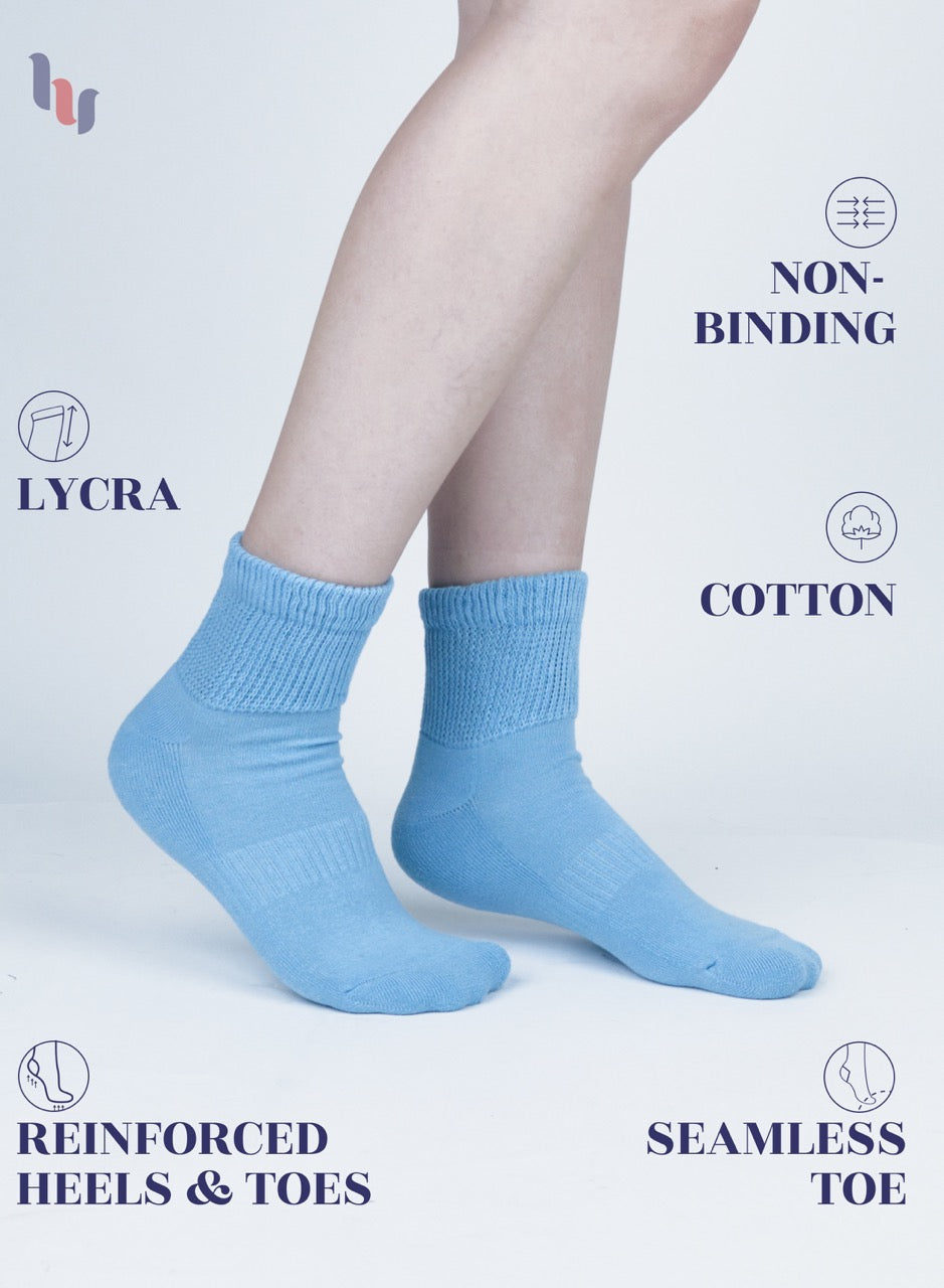 Blue socks worn by a person on a light gray background with text highlighting features.