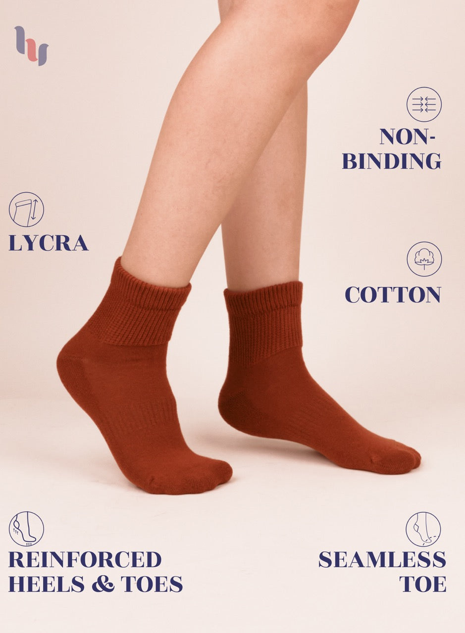 bombay Brown socks worn with text highlighting features on a beige background