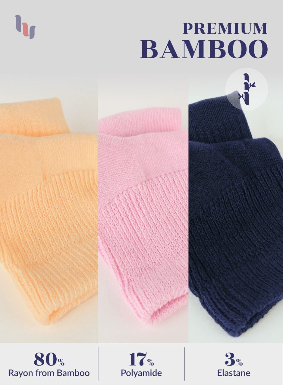 Three folded fabrics in peach, pink, and navy with text indicating material composition on a light gray background.