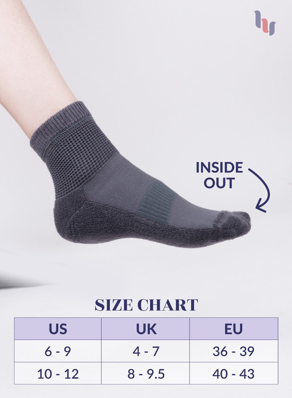 Gray sock with size chart on a light gray background