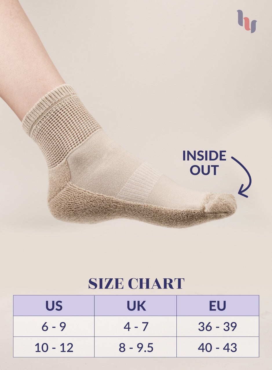 Light Beige sock with size chart on a light gray background