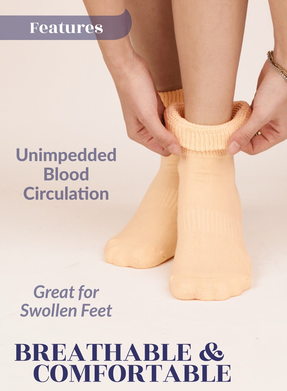 Person wearing Medium Beige socks with text highlighting features on a light background