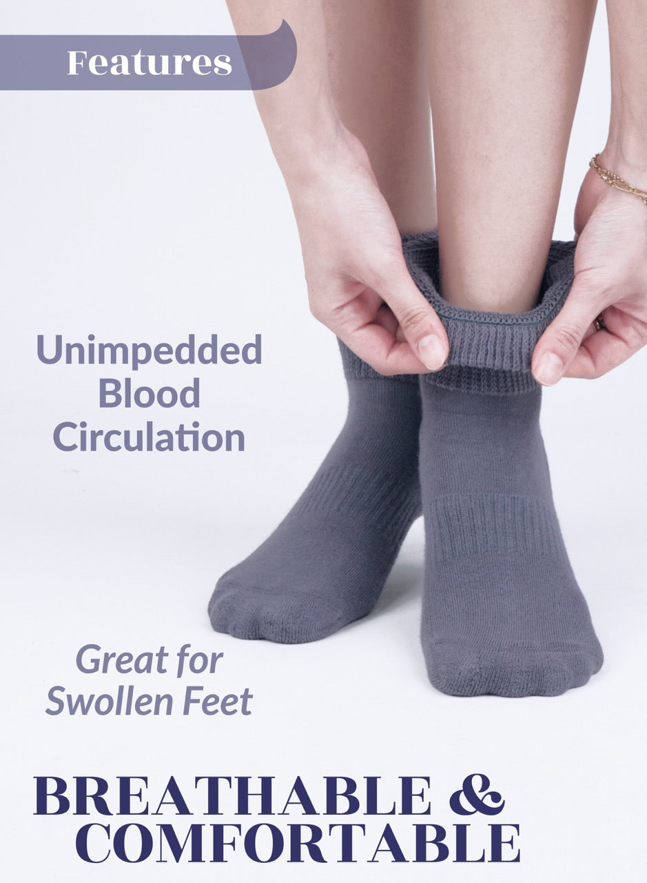 Person wearing Medium gray socks with text highlighting features on a light purple background