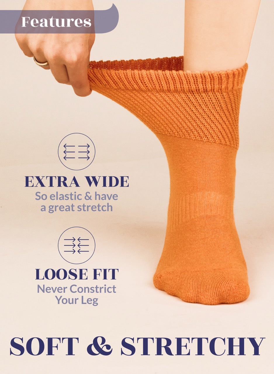 Pumpkin Orange sock being worn with text highlighting features on a beige background