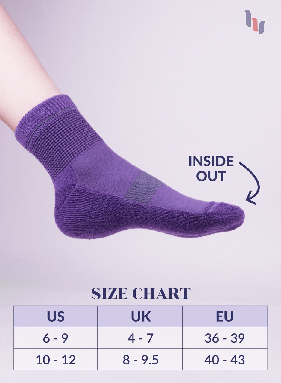 Purple sock with size chart on a light gray background