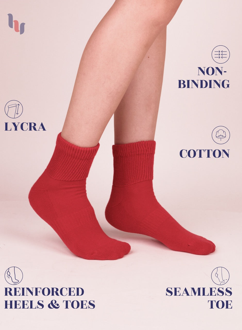 Red socks worn with text highlighting features on a light pink background