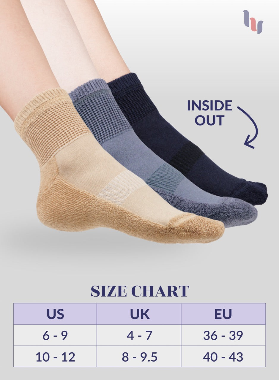 Three pairs of socks in beige, navy blue, and grey with a size chart below on a light gray background.
