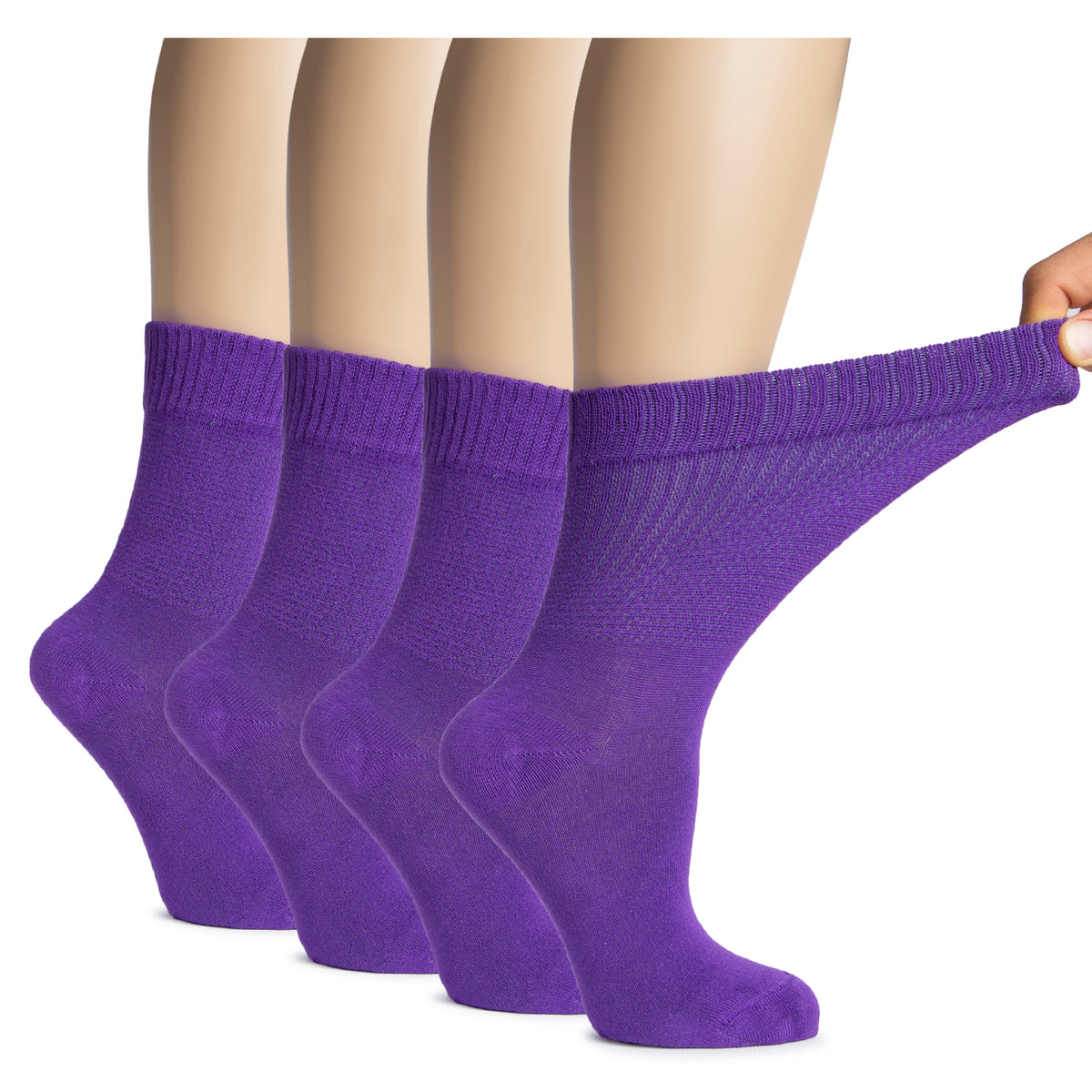 A woman's hand holds a pair of Women's Bamboo Diabetic Crew Socks in purple, designed for comfort and support.
