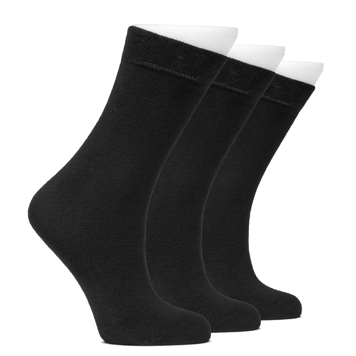 A trio of black cotton dress crew socks for kids, neatly arranged on a white background.