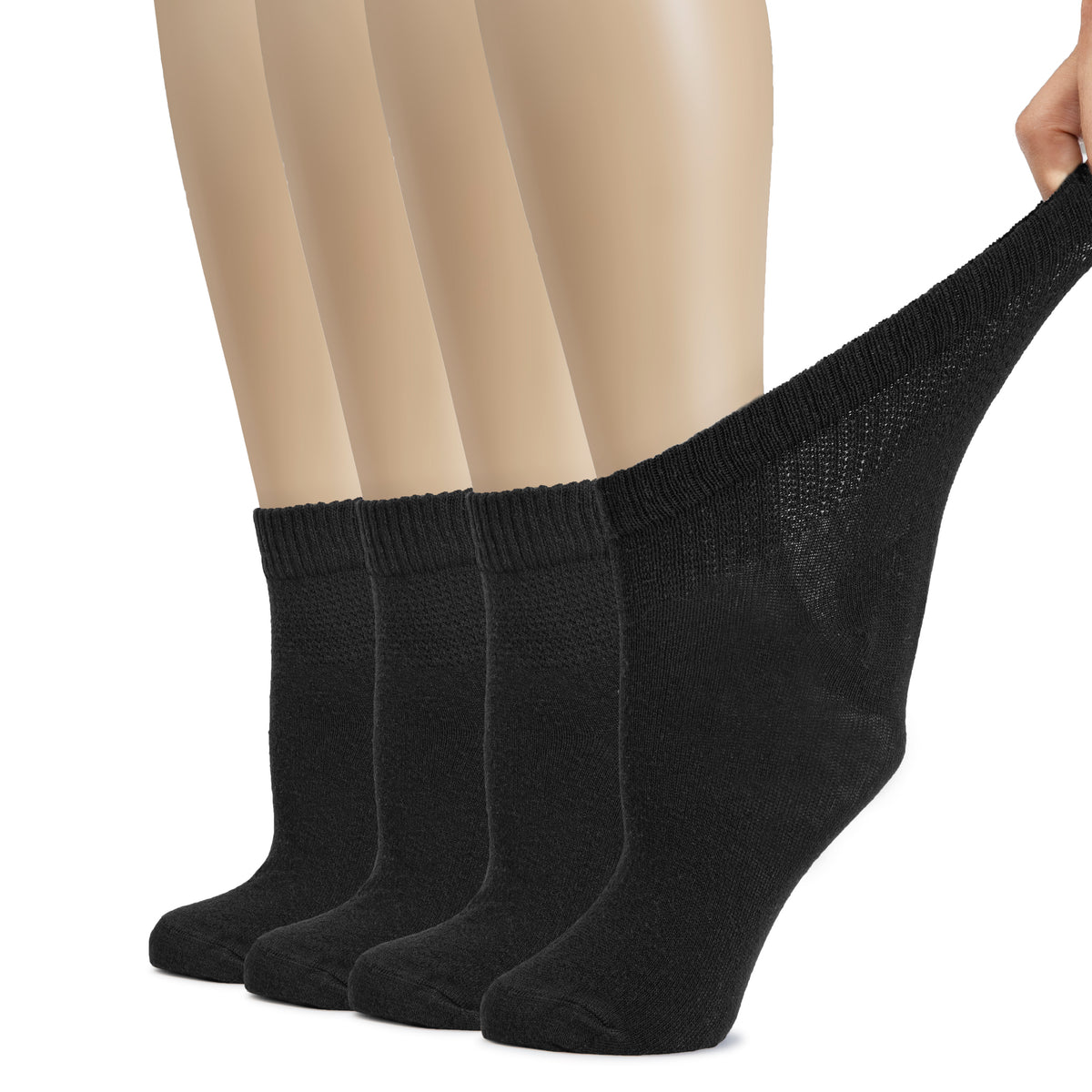 The image depicts a woman's feet adorned with Women's Cotton Diabetic Ankle Socks in black. The socks are arranged in a neat row.