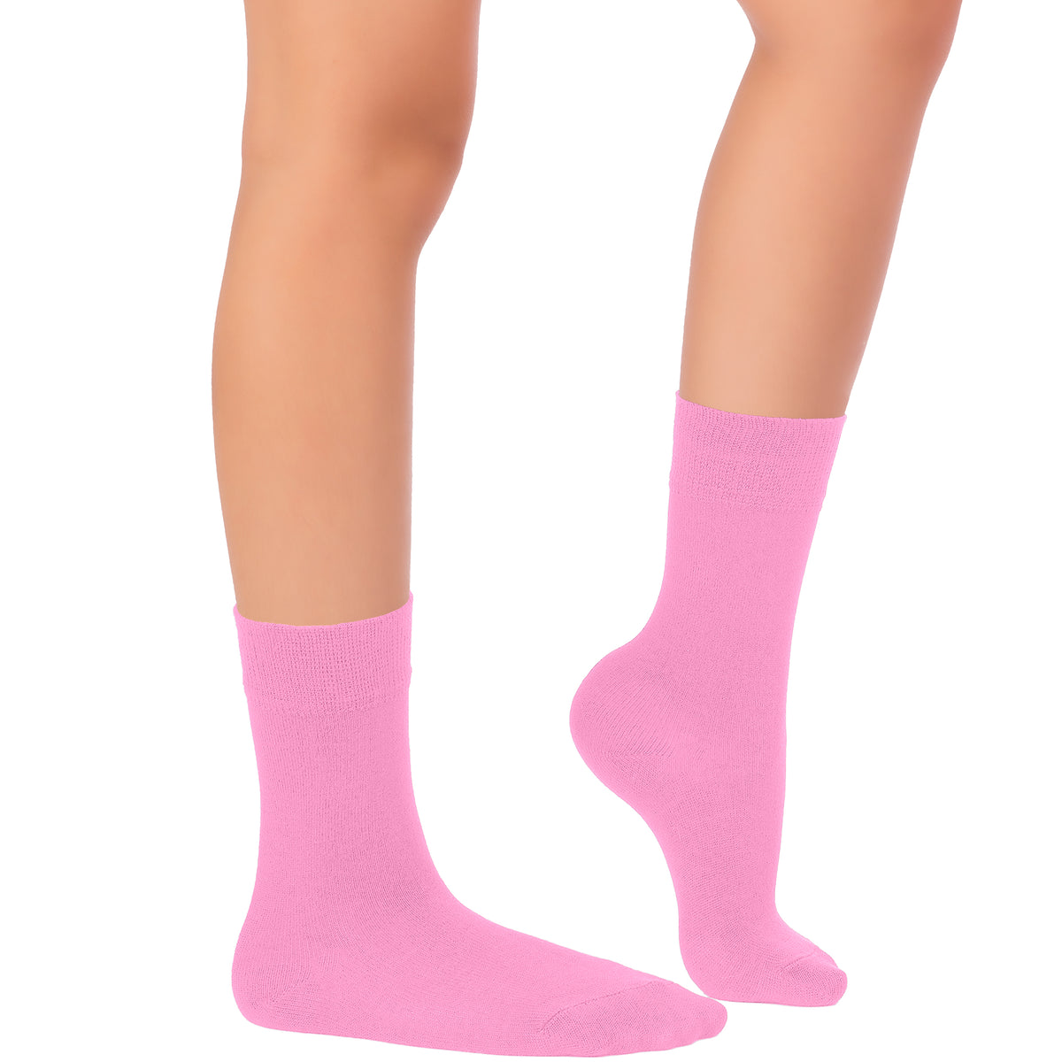 A photo of a woman's legs in pink socks against a white background. The socks are the 'Kids' Dress Crew Bamboo' style.