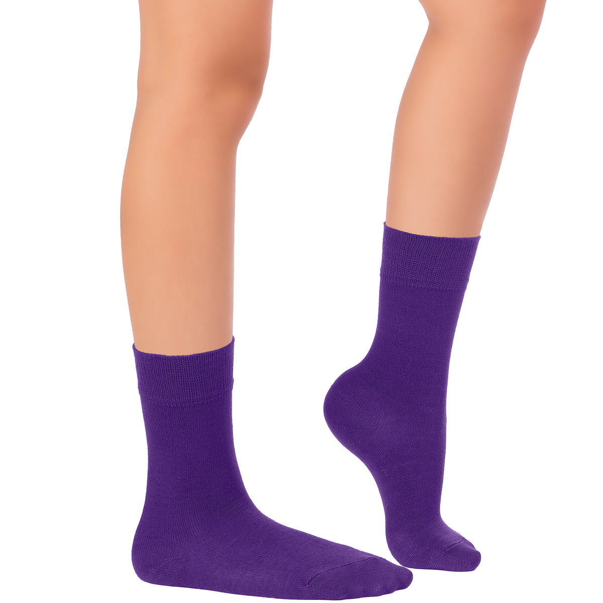 This image depicts a woman's legs adorned in purple socks made of bamboo material from the 'Kids' Dress Crew' collection.