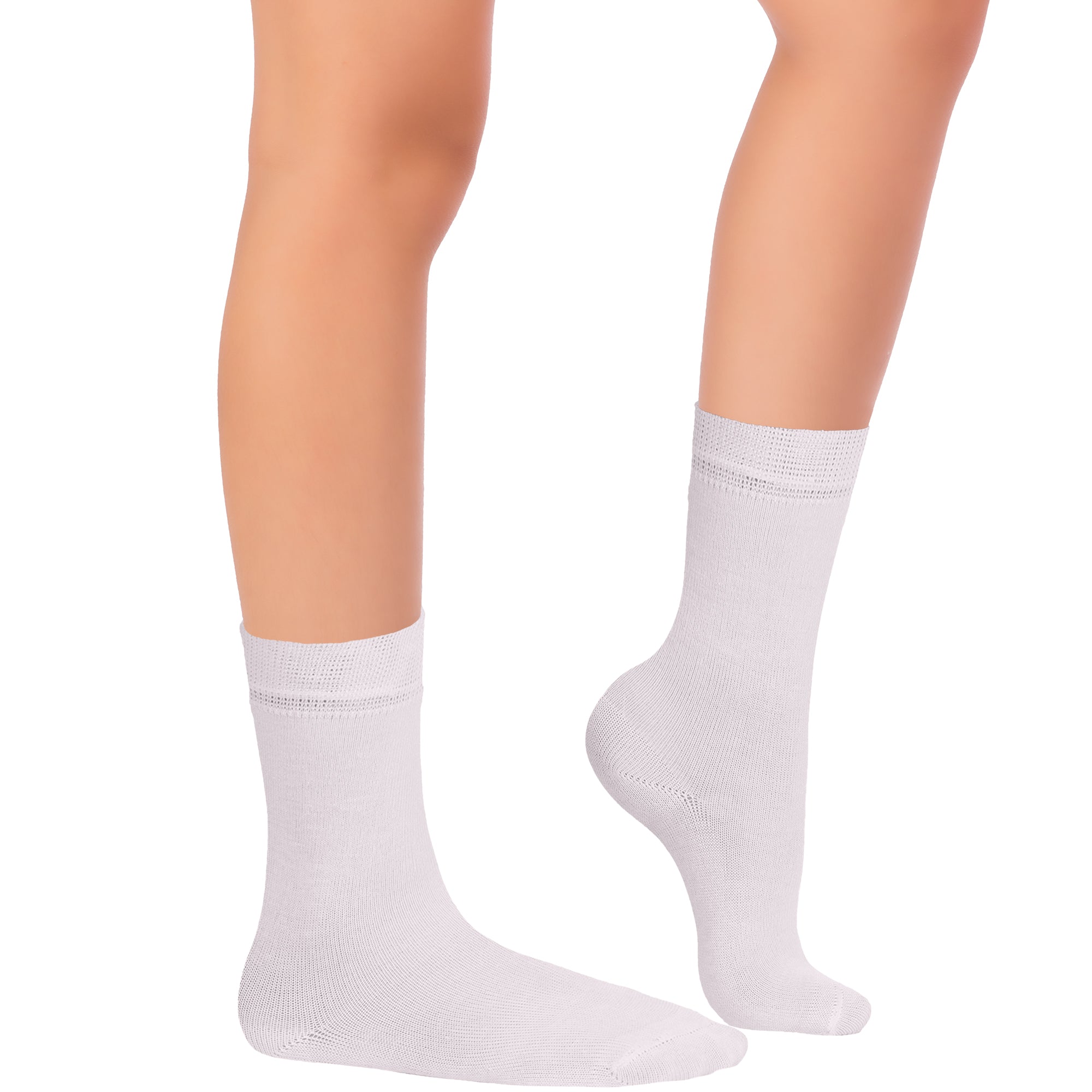 A pair of Kids' Dress Crew Bamboo socks in white, worn by a woman whose legs are visible against a white background.