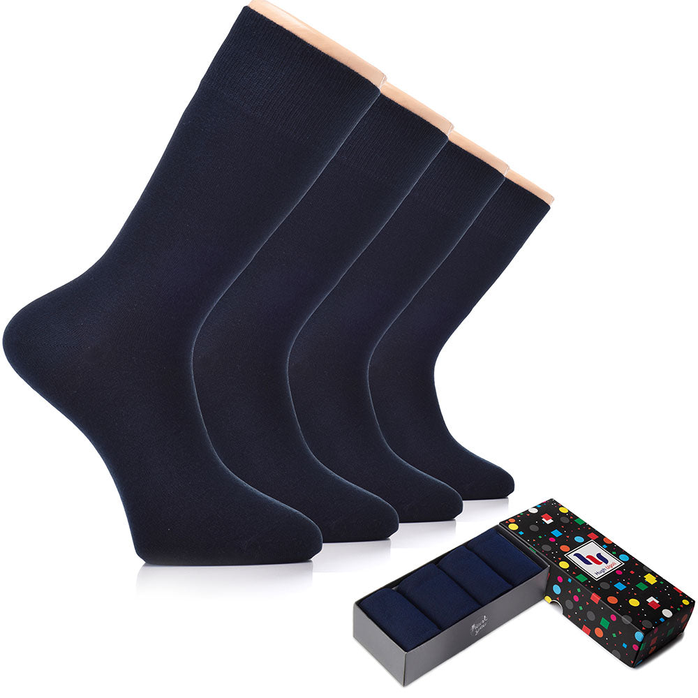 A box containing three pairs of men's bamboo dress socks, perfect for any formal occasion.