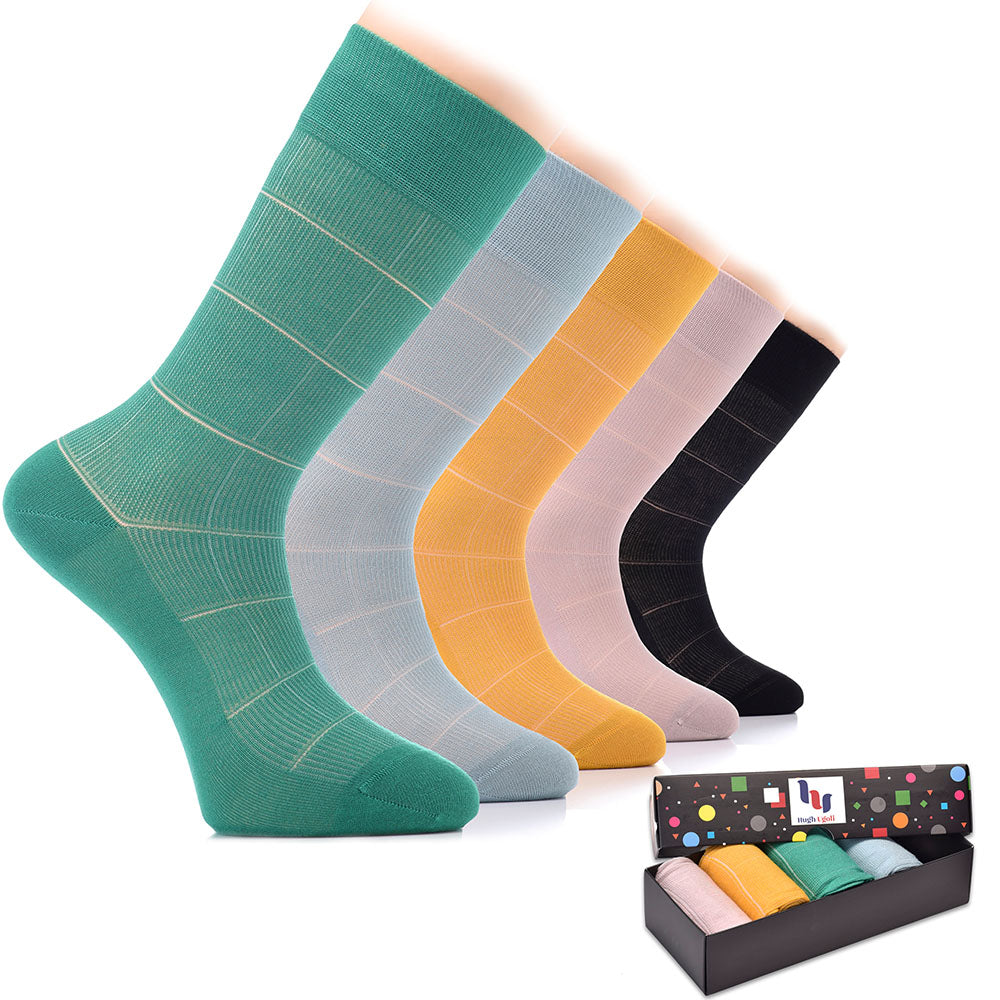 A box containing six pairs of Bamboo Dress Funky Socks, each pair featuring a unique and vibrant color scheme, perfect for adding a pop of color to any outfit.