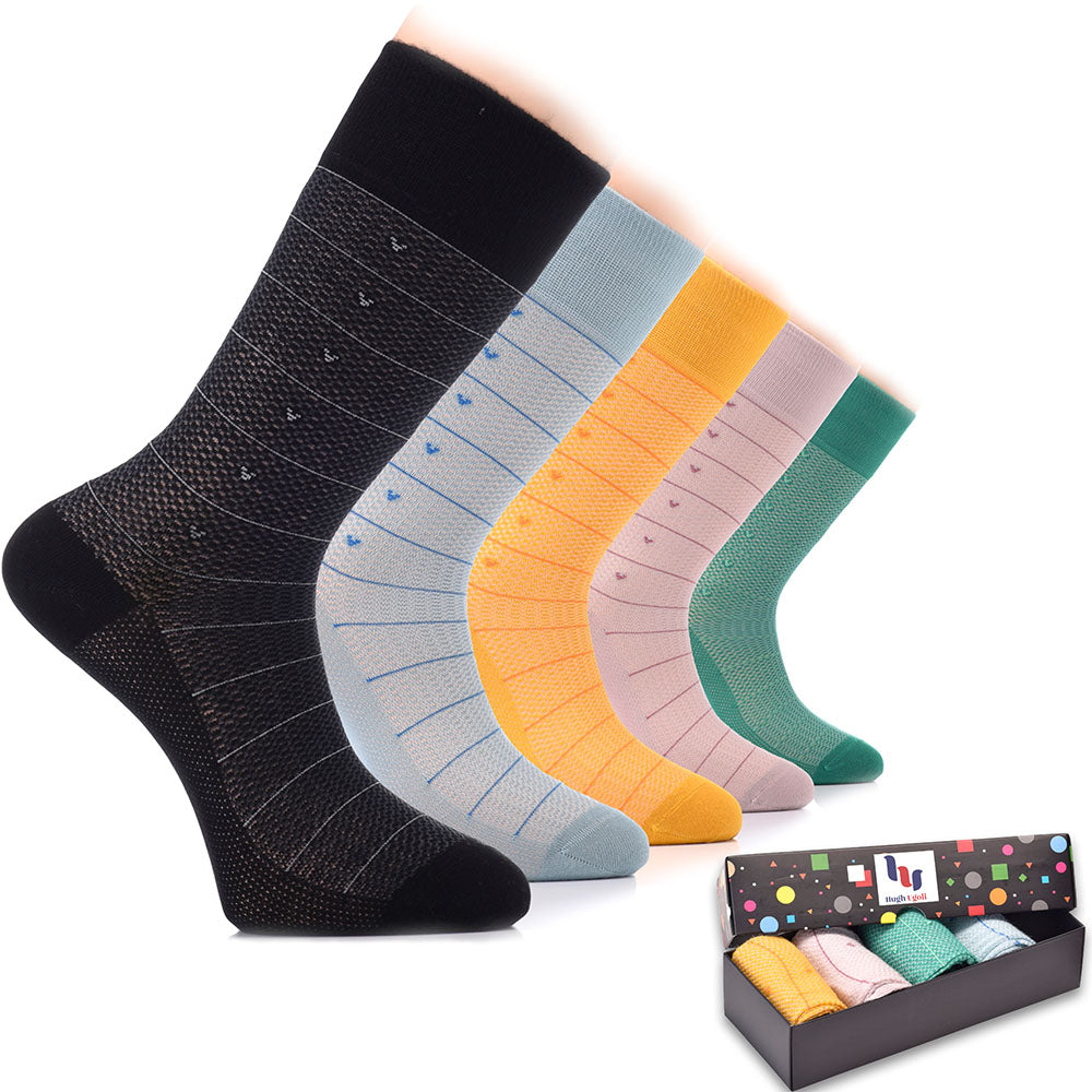 This image shows a box of Bamboo Dress Funky Socks, which includes six pairs of socks in various colors and patterns.