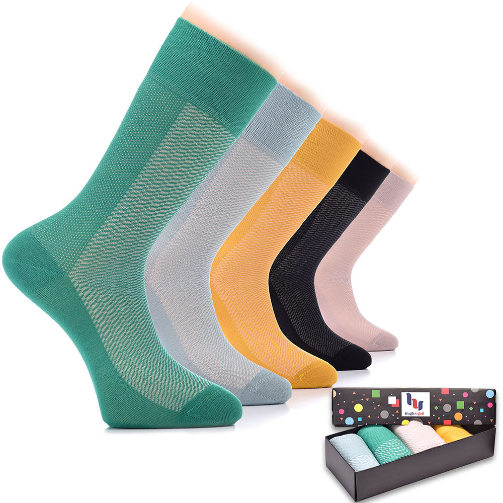 A box of Bamboo Dress Funky Socks containing six pairs of socks in various colors, perfect for adding a pop of fun to any outfit.
