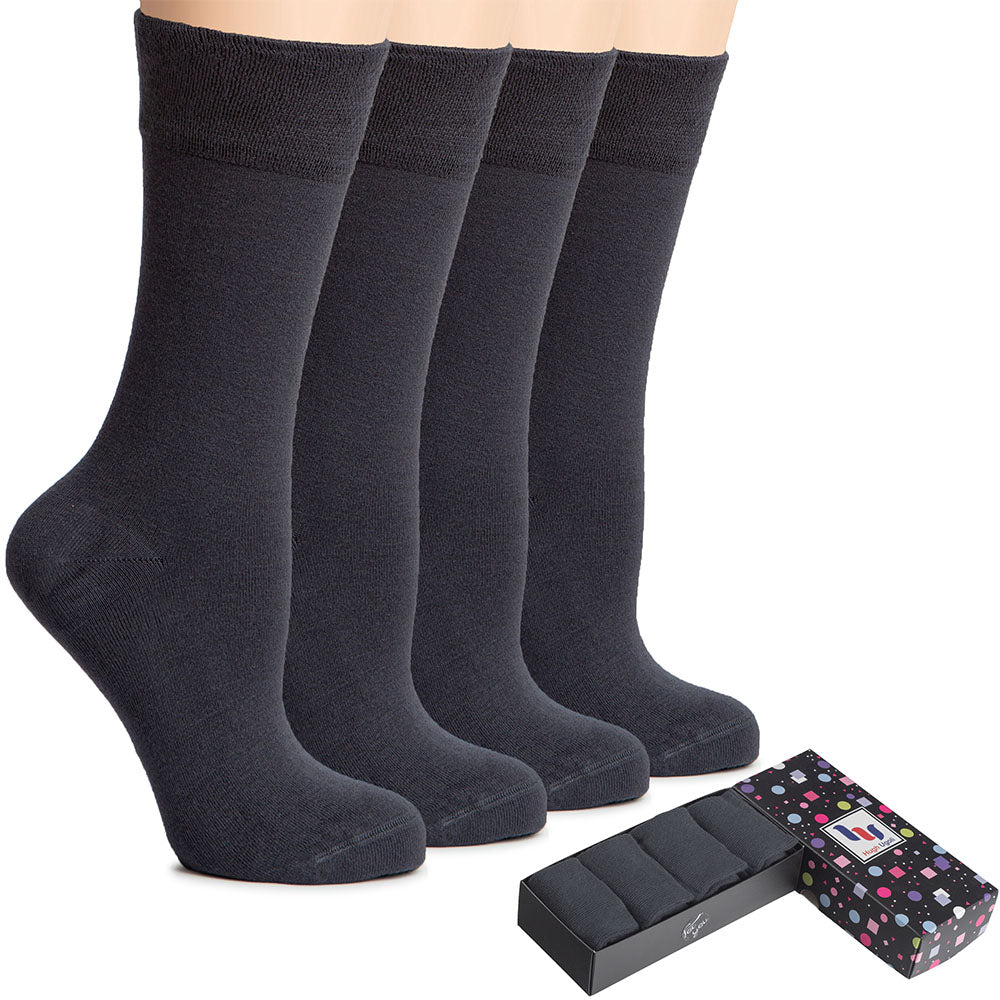 A box containing three pairs of Women's Cotton Crew Socks in Charcoal Gray color, perfect for adding a touch of elegance to any outfit.